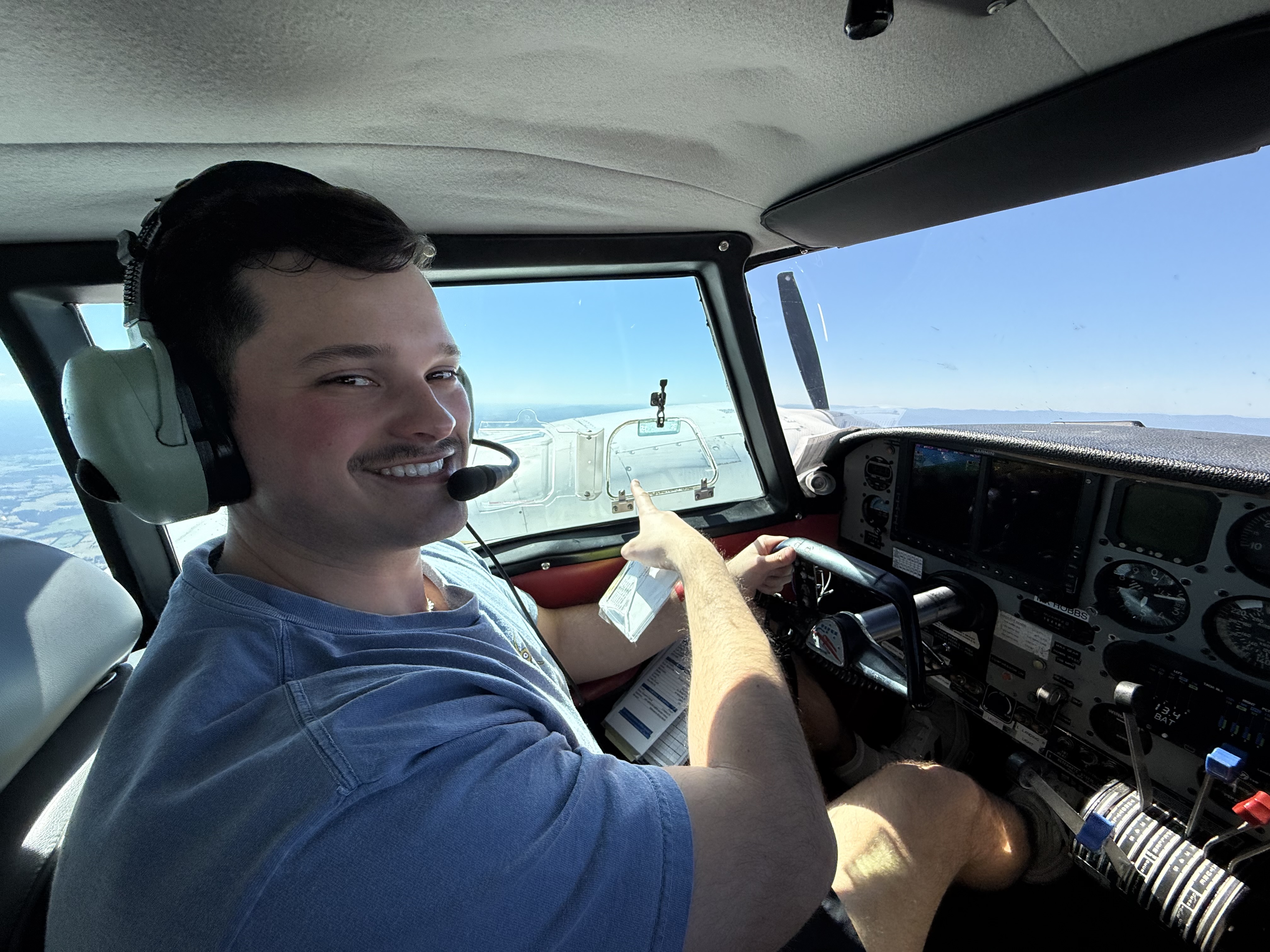 Multi Engine student flying with one engine sopped. Still smiling.