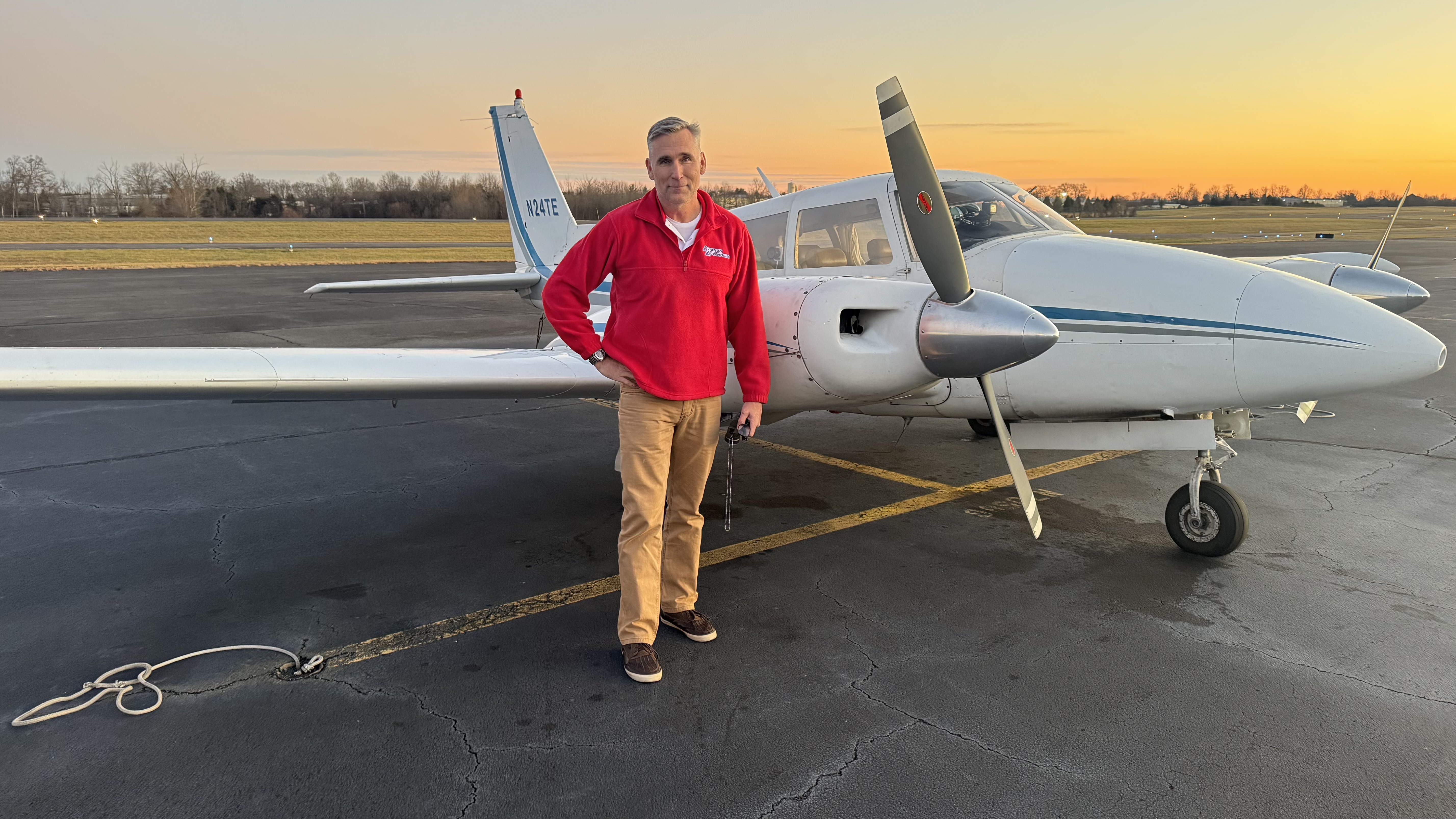 Tony Wright in a small general-aviation aircraft.