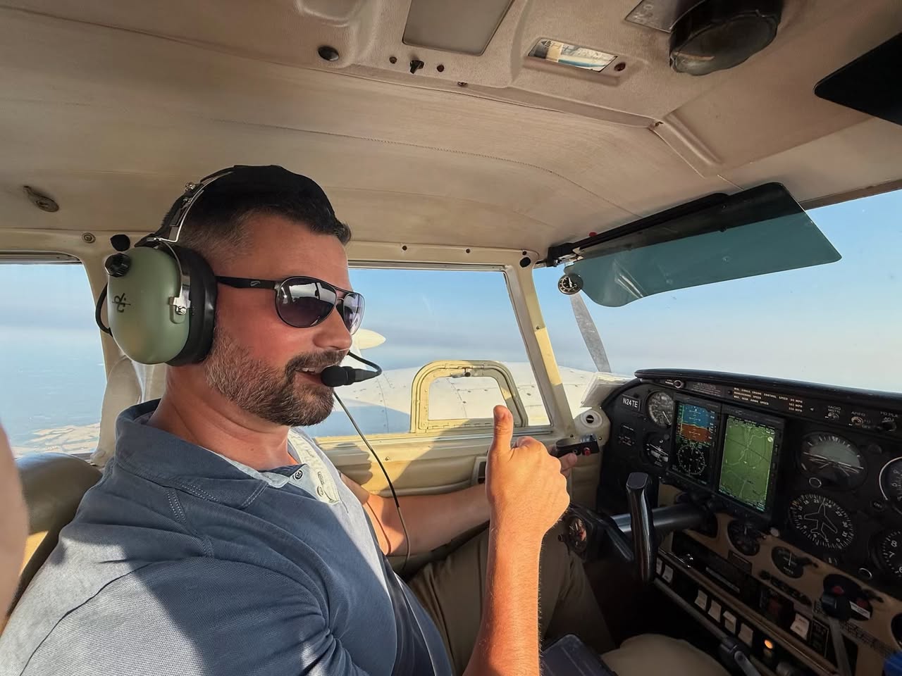 Multi Engine student flying with one engine sopped. Still smiling.