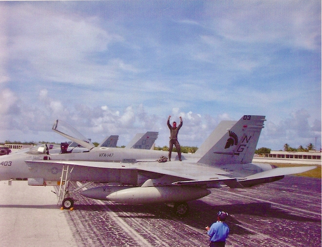 Tony Wright celebarating a brush with death over the Pacific ocean.